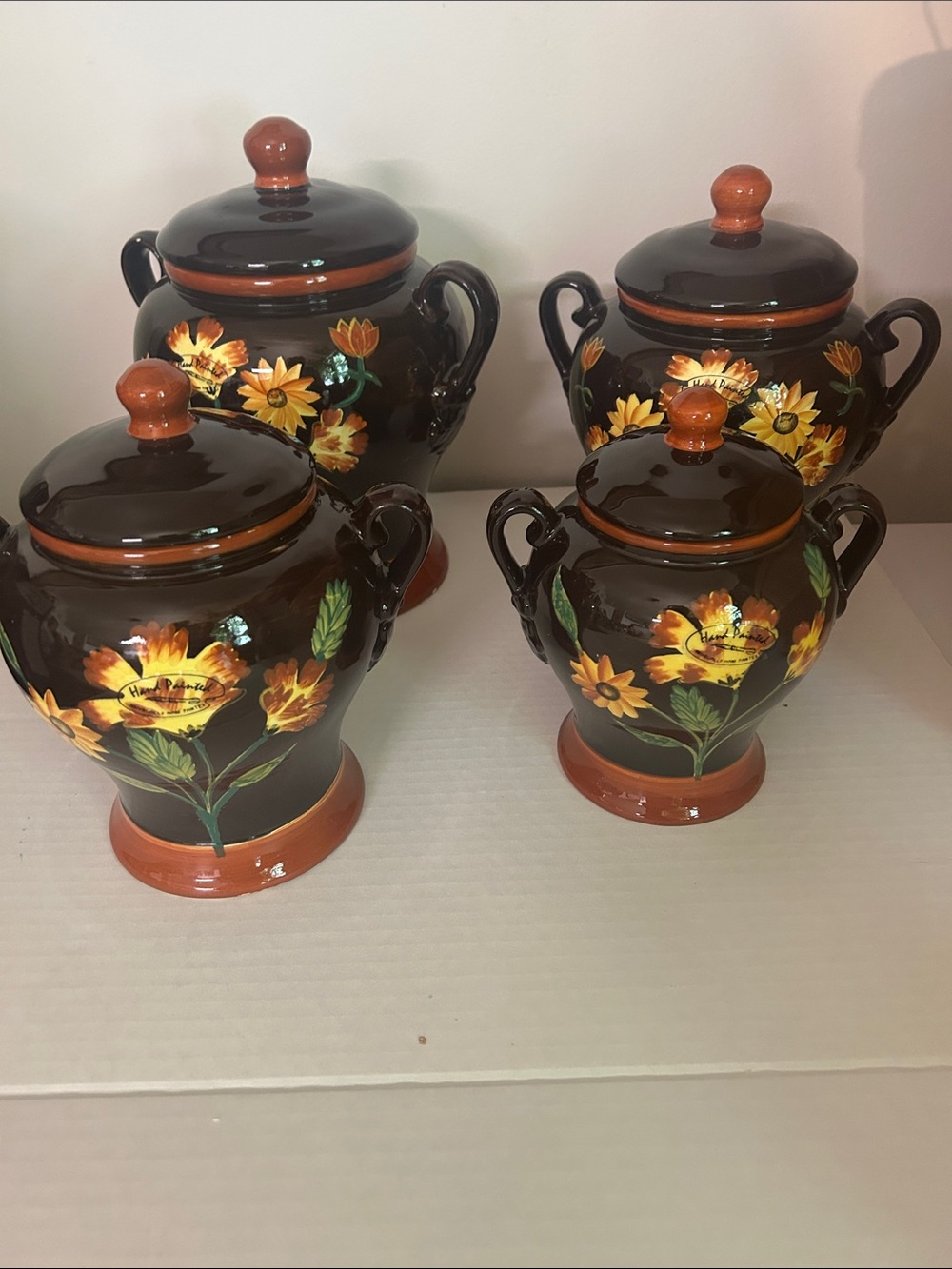 Hand-Painted Floral Ceramic Canister Set in Brown and Orange ACK set of 4